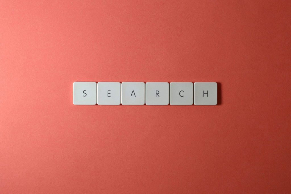 Keyboard keys that spell out "Search" to show the link with alt text and search engines.
