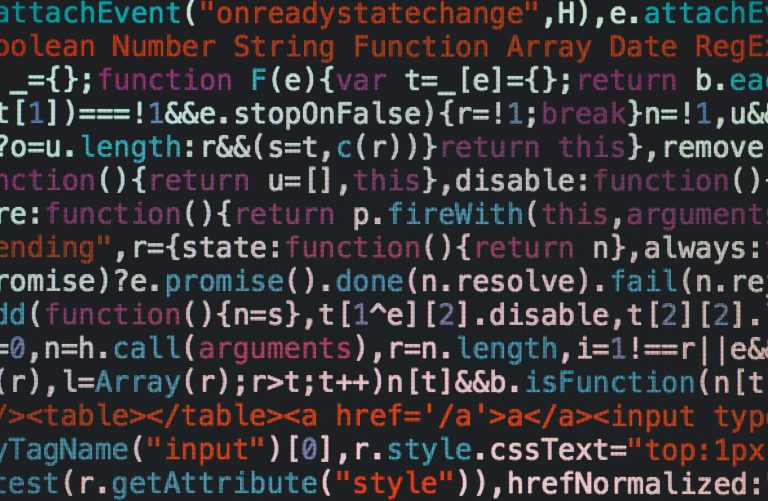 A screen of html code written against a black background