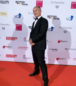Wil Masisak media lead at Wordsmithie content agency happy place on the red carpet in a tux